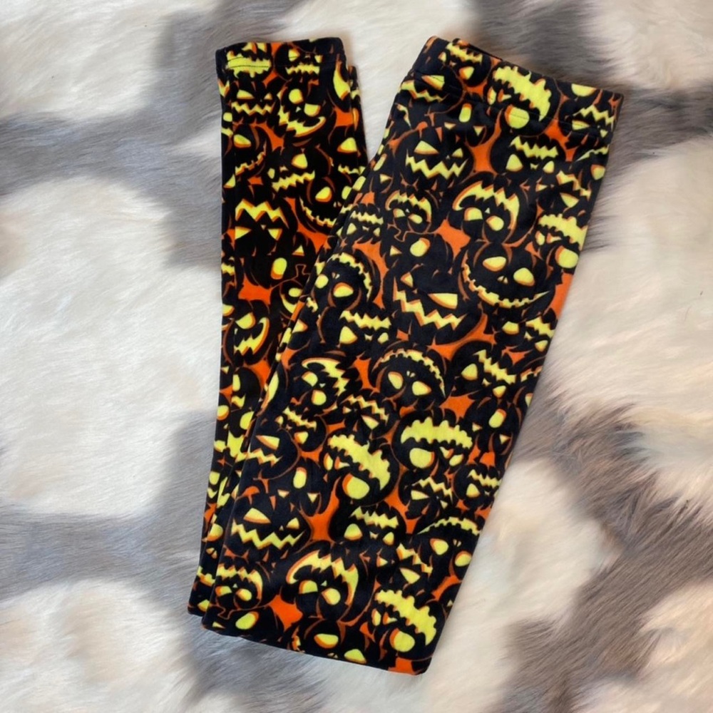 Halloween black yellow and orange jack o lantern pumpkin soft velour leggings
